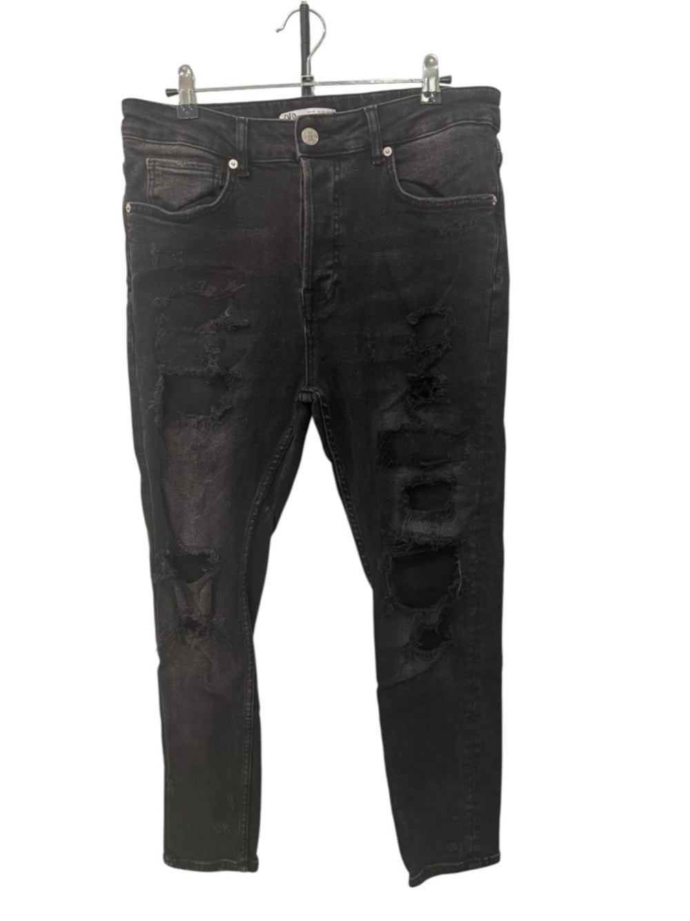 Zara distressed button fly black denim jeans featuring heavy rips size 32